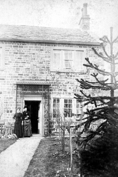 Armisteads and monkey puzzle tree.jpg - Thought to be the Armisteads at the Manse. - Date not known  Looks like same building and much younger Monkey Puzzle tree as in the next slide. 